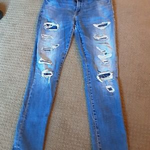 Womens AMERICAN EAGLE `faded distressed jeans